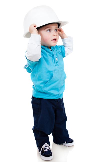 Little boy wearing a helmet - isolated over a white background