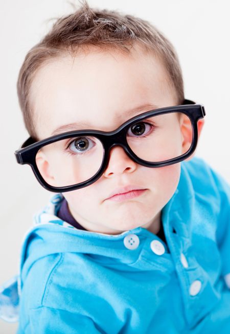 Little boy wearing big glasses - isolated over a white background