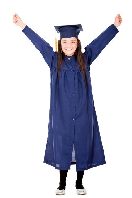 Happy girl graduating with arms up - isolated over a white background
