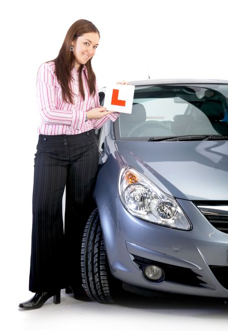 business woman learning to drive in her new car - isolated over a white background