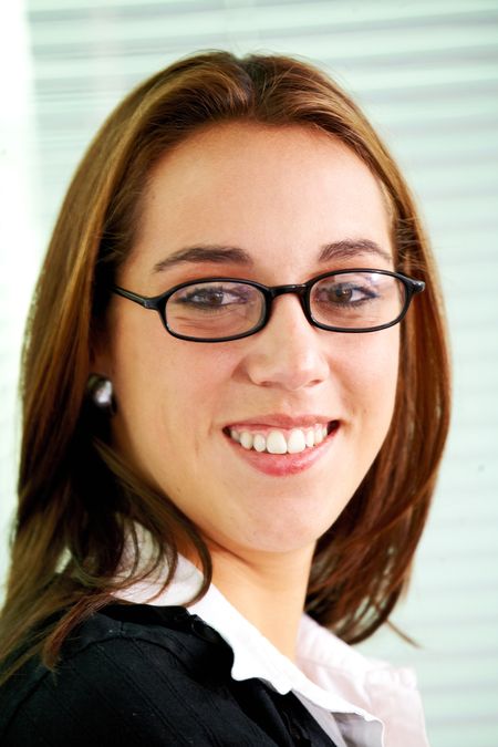 business woman portrait smiling in an office