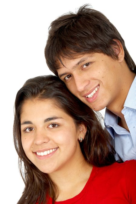 happy couple of young adults portrait smiling isolated over a white background