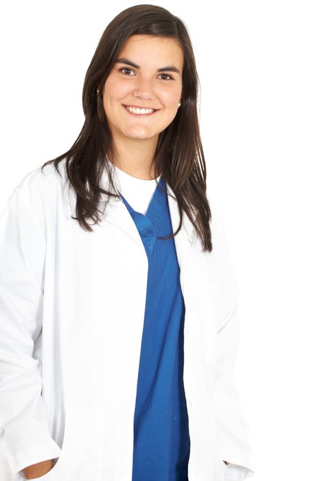 friendly woman doctor smiling isolated over a white background