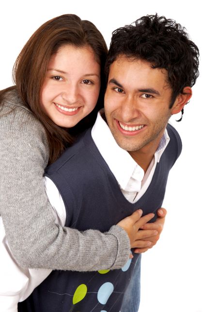happy young teenage couple portrait smiling isolated over a white background