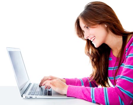 Woman browsing on her computer - isolated over a white background
