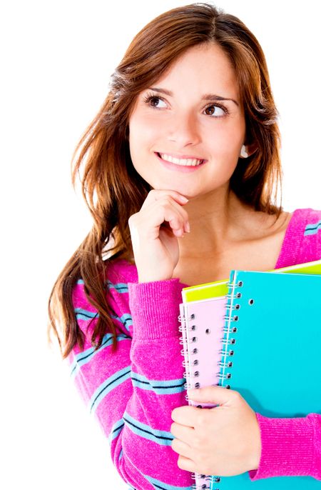 Pensive female student looking up - isolated over a white background
