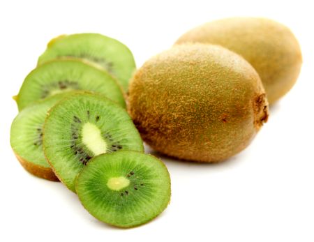 green kiwi fruit isolated over a white background