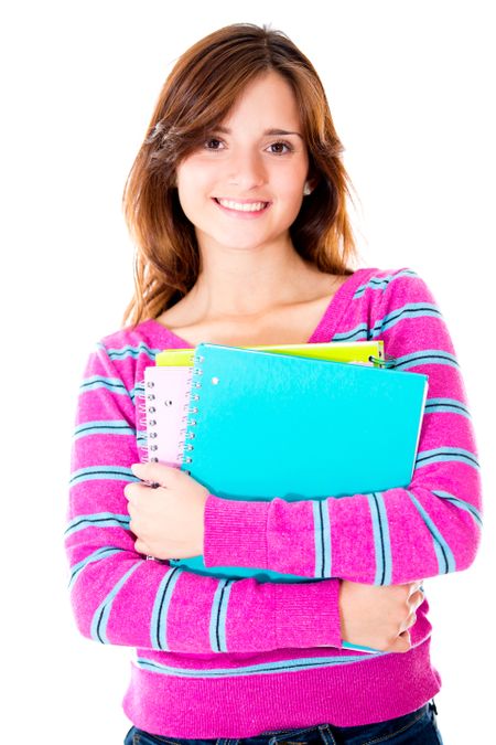 Casual female student holding notebooks - isolated over white