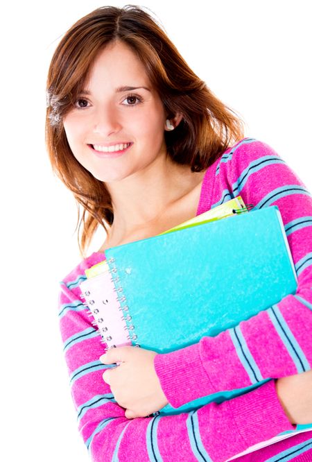 Girl holding notebooks and smiling - education portrait