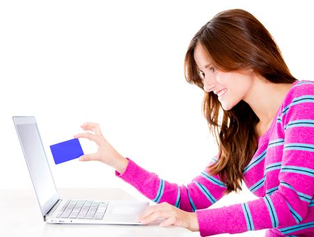 Woman shopping online through her computer - isolated over white