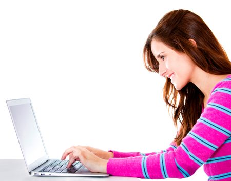 Girl working on the computer - isolated over a white background