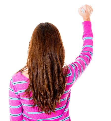 Rear view of a woman writing on the wall - isolated over white background