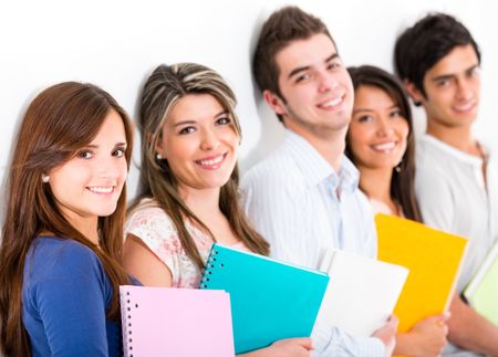 Group of students with notebooks - isolated over a white background
