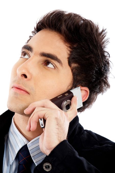 Business man on the phone isolated over a white background