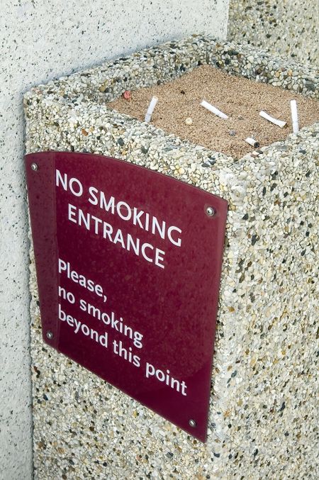 Outdoor ashtray with NO SMOKING sign