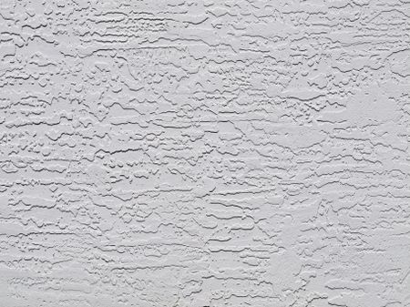 Texture of exterior gray stucco wall