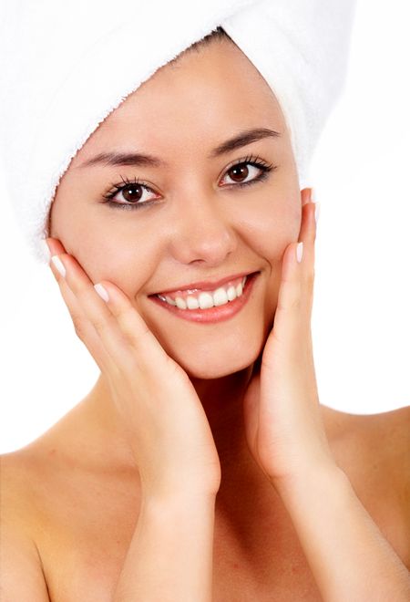 beauty and spa portrait of a very healthy looking girl isolated over a white background