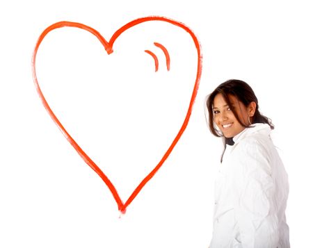 painted heart of love on the wall isolated over a white background