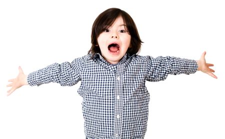 Boy screaming with arms open - isolated over a white background