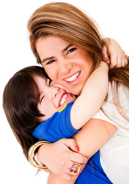 Loving mother and son smiling - isolated over a white background