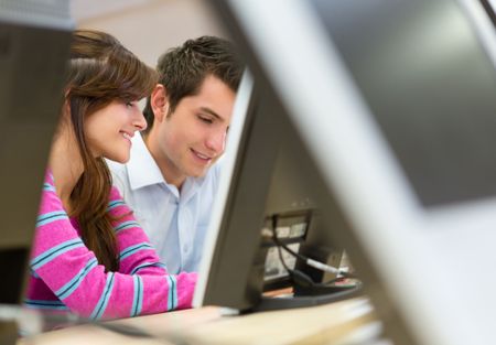 Study group at the university using a computer