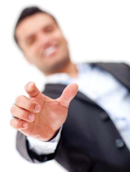 Businessman with hand extended about to point at something - isolated over white