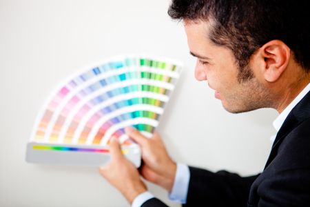 Interior designer with color palette ready to decorate