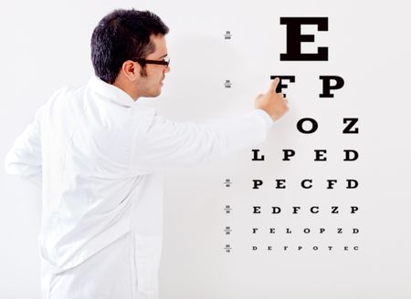 Male optemetrist making an eye vision test