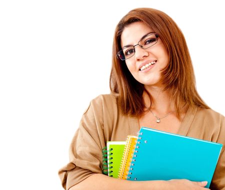 Happy female student holding notebooks - isolated over a white background