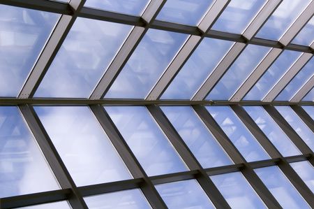 Skylight with reflections and blue sky
