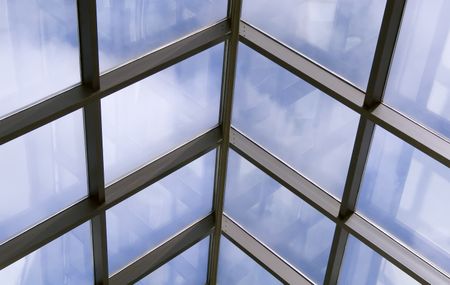 Skylight with reflections and blue sky