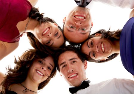 happy group of friends smiling with their heads together isolated over a white background