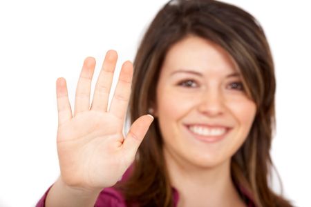 girl showing her hand isolated over a white background