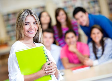 Beautiful female student smiling at the university