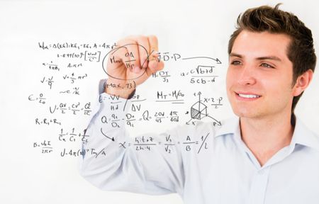 Male student writing math formulasÃ¢Â?Â? education portrait