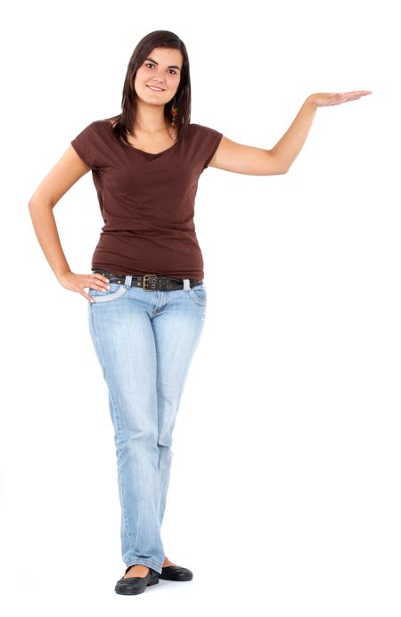 casual woman smiling displaying something isolated over a white background