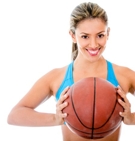 Female basketball player holding the ball - isolated over white