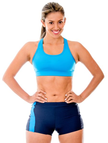 Gym woman smiling - isolated over a white background