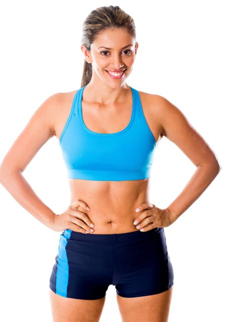 Fit woman in sportswear - isolated over a white background