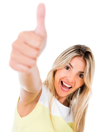 Excited woman with thumbs up - isolated over a white background