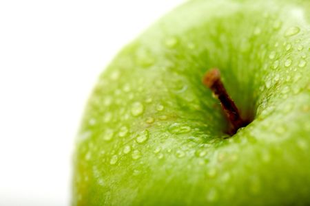 green apple closeup isolated over a white background
