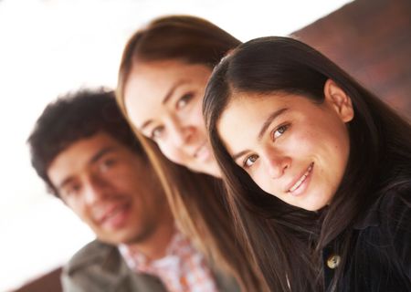 happy group of friends smiling outdoors portrait