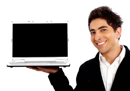 Business man displaying a laptop computer - isolated over a white background