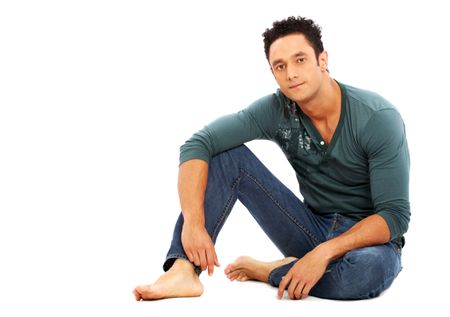 caucasian casual man on the floor - isolated over a white background