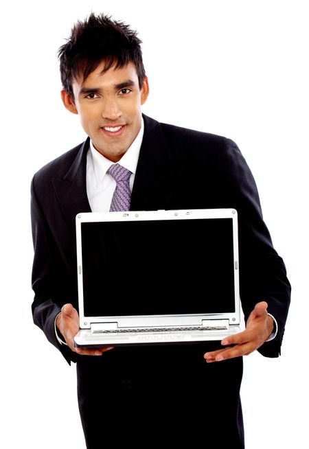 Business man displaying a laptop computer - isolated over a white background