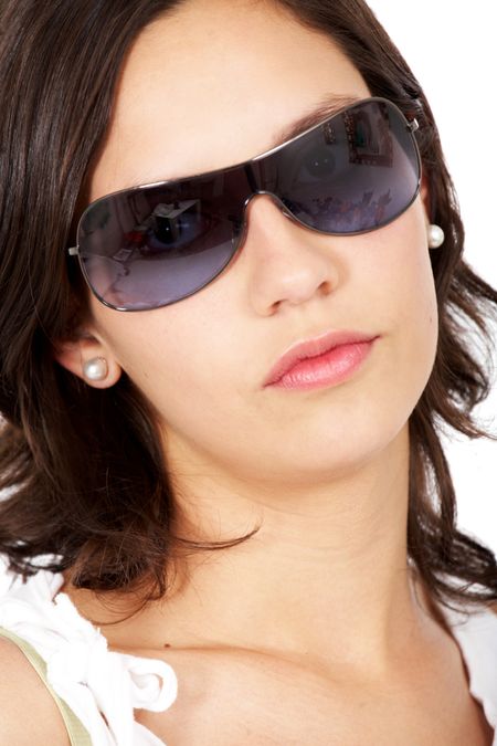 fashion or casual woman portrait wearing sunglasses - isolated over a white background