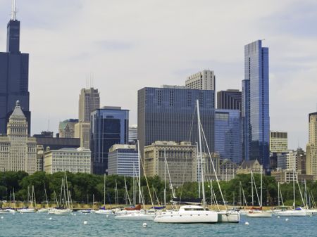 Cityscape in summer: Chicago skyline as seen from Monroe Harbor, with Willis Tower (formerly known as Sears Tower) in background at left