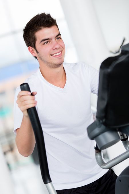 Young man working out at the gym