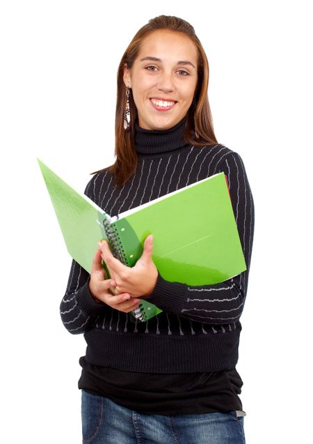 casual female student smiling and holding a notebook - isolated over a white background