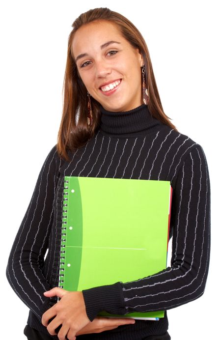 casual female student smiling and holding a notebook - isolated over a white background